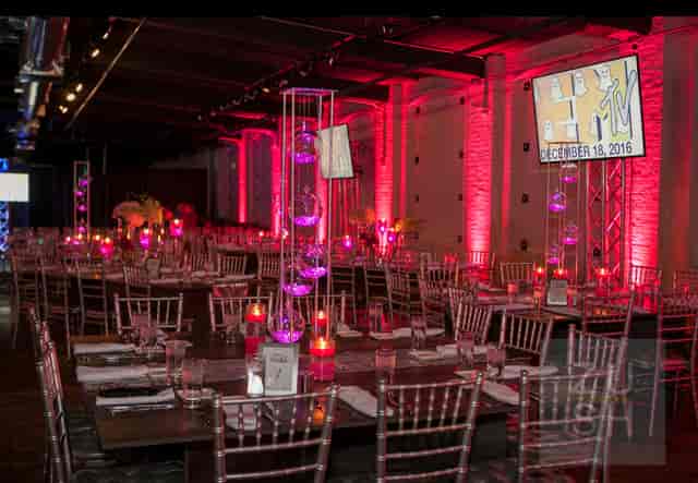 Elegant event space at Factory220 with pink lighting for corporate gatherings.