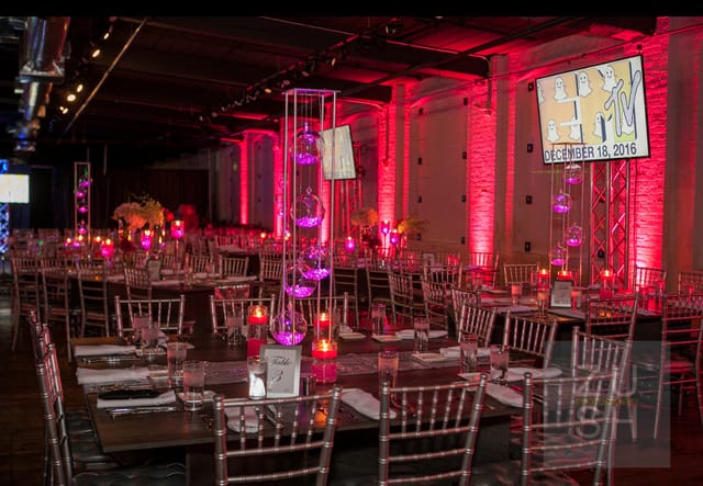 Elegant event space at Factory220 with pink lighting for corporate gatherings.