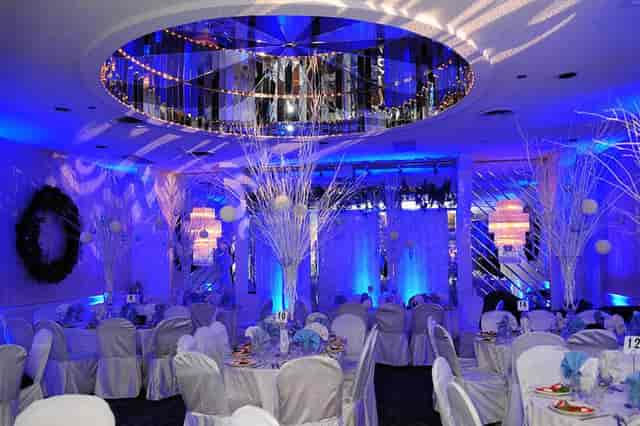 Elegant catering hall with blue hues, ideal for upscale events and celebrations.