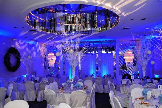 Elegant catering hall with blue hues, ideal for upscale events and celebrations.