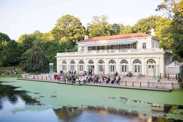 The Boathouse at Prospect Park, elegant venue by serene pond for outdoor events.
