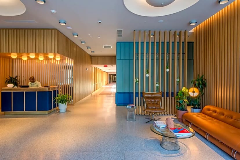 Modern reception area with wood accents, perfect for meetings and events.