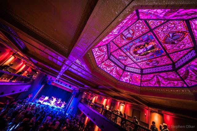 "White Eagle Hall Jersey City vibrant event space with ornate ceiling, ideal for performances."