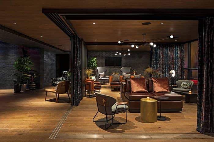 Stylish lounge area in Moxy East Village, perfect for networking events and meetings.