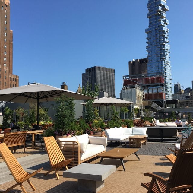 Stylish rooftop venue in Spring Place, NYC, perfect for events with city skyline views.