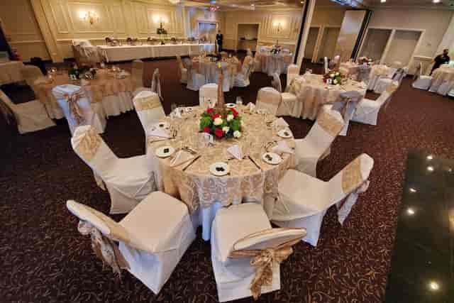 Elegant banquet hall with gold linens, perfect for formal events and celebrations.