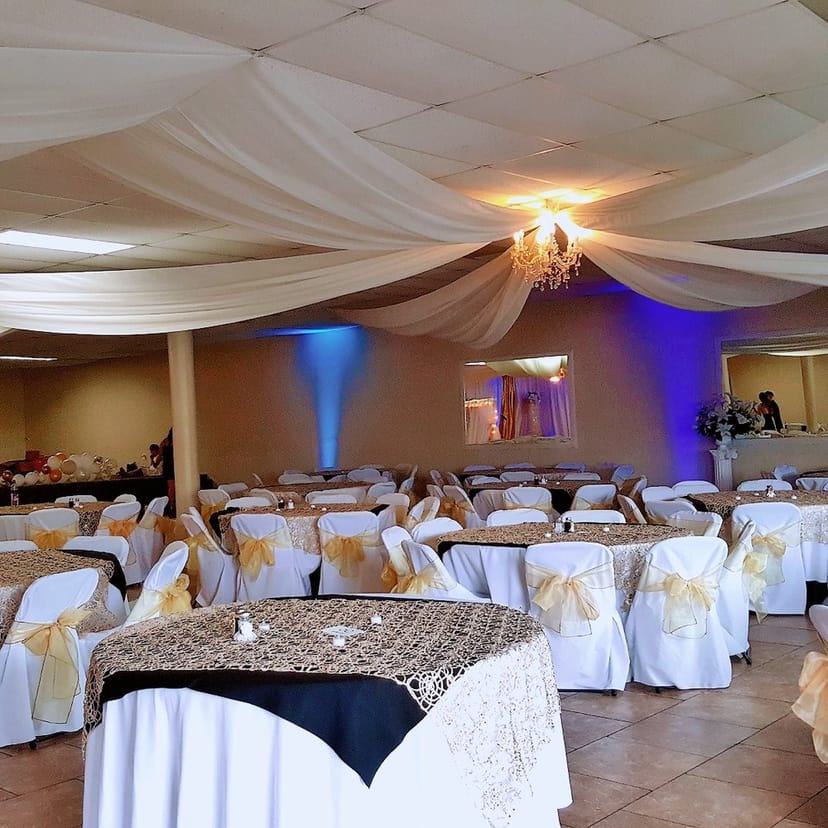 Large Banquet Room at The Iron Lily Venue, elegantly draped for weddings and events.