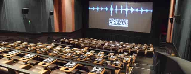 Modern auditorium with spacious seating for corporate events at Pruneyard Cinemas.