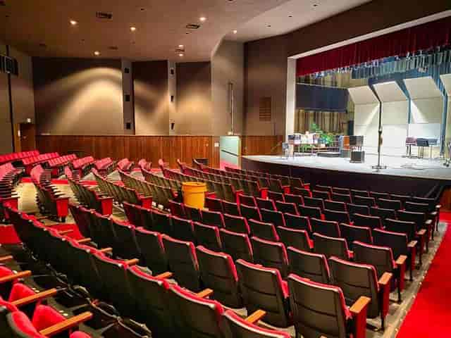 Backstage area at West Valley College Theater with tiered seating for events and conferences.