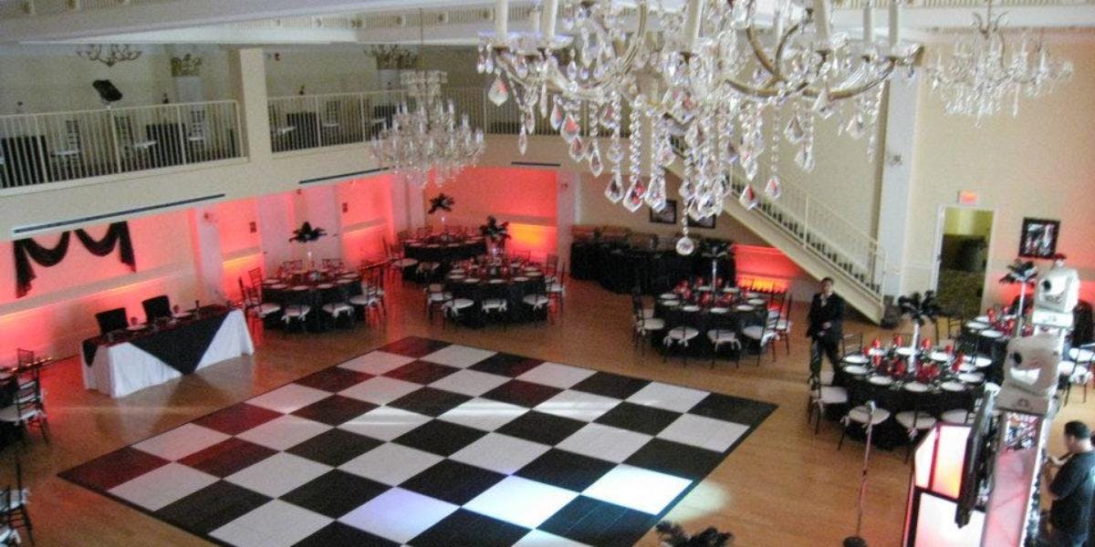 Historic Grand Ballroom with checkered dance floor, perfect for elegant weddings and galas.