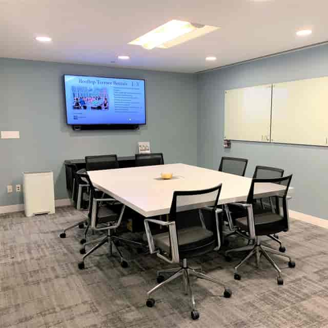 Modern conference room with large table, ergonomic chairs for meetings in Union City.