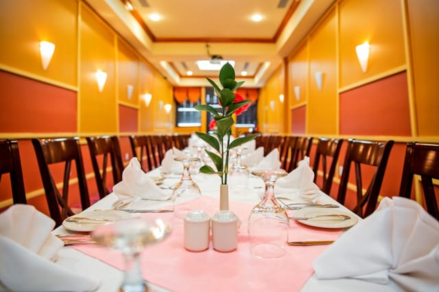 Elegant dining setup at The Door Restaurant for formal meetings and events.