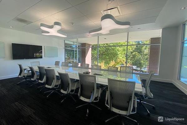 Modern conference room with ergonomic chairs for corporate meetings in San Jose.