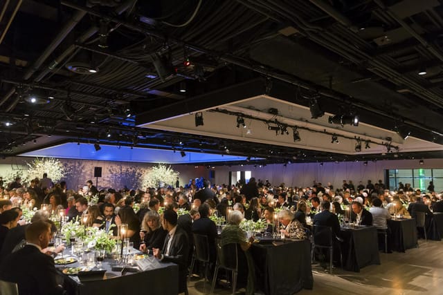 Elegant gala at The Shed, Union Square: floral centerpieces and ambient lighting.