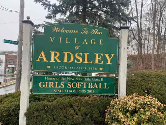 Community Center in Ardsley with welcoming sign, ideal for sports events and gatherings.
