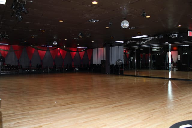 Spacious Imperial Ballroom with polished floors, perfect for dance events and gatherings.