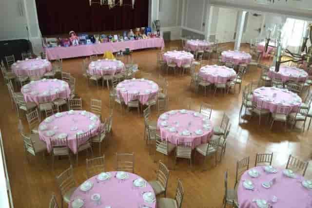 Ballroom banquet setup with pink tablecloths at Women's Club of Glen Ridge.