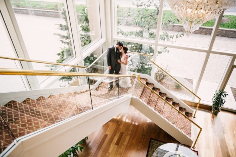 Elegant wedding venue with staircase and natural light at Il Tulipano Ballroom.