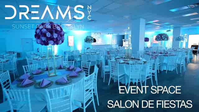 Elegant event space with floral centerpieces, perfect for weddings and corporate events.
