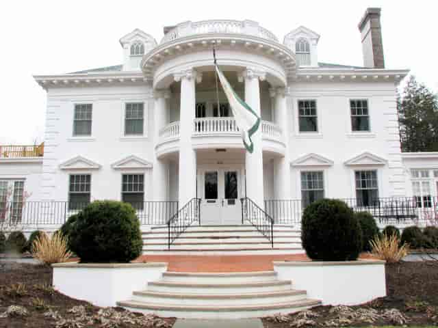 Elegant white mansion at Twin Maples, ideal for upscale events and corporate gatherings.