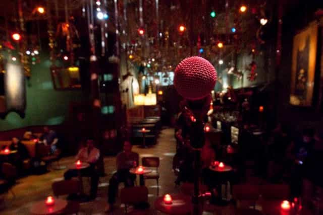 Cozy Make Out Room venue with microphone, perfect for open mics and small concerts.