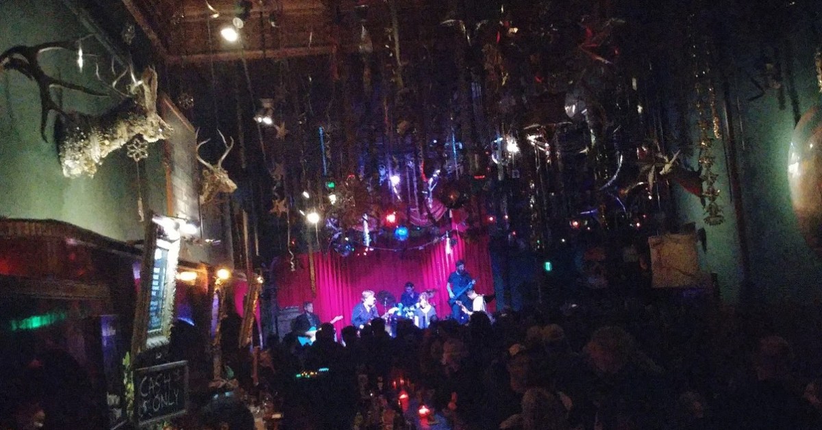 Vibrant live music venue with eclectic decor, ideal for intimate events and performances.