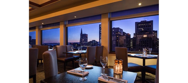 Leatherneck Steakhouse dining area with elegant settings, perfect for upscale events.