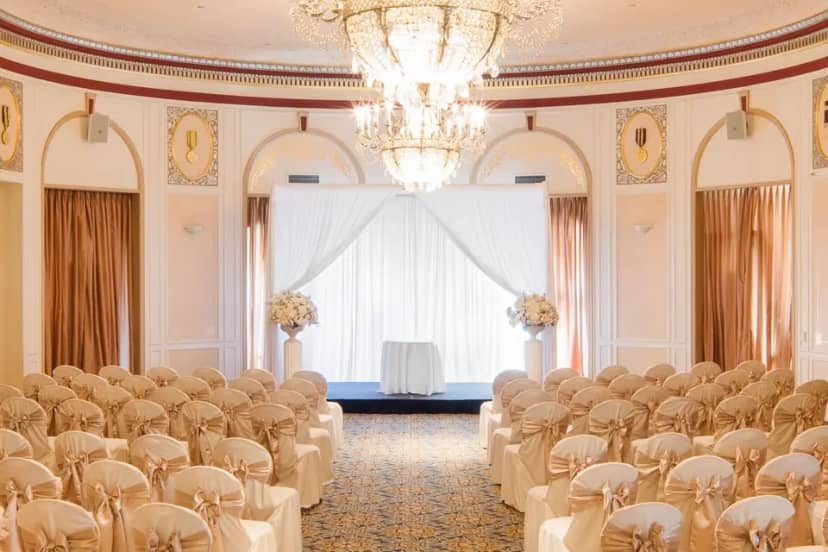 Elegant Crystal Ballroom with chandeliers, perfect for weddings and formal events.