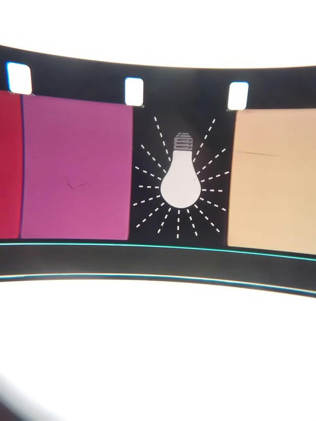 Colorful wheel with light bulb icon symbolizing creativity in event planning at Canyon Cinema.