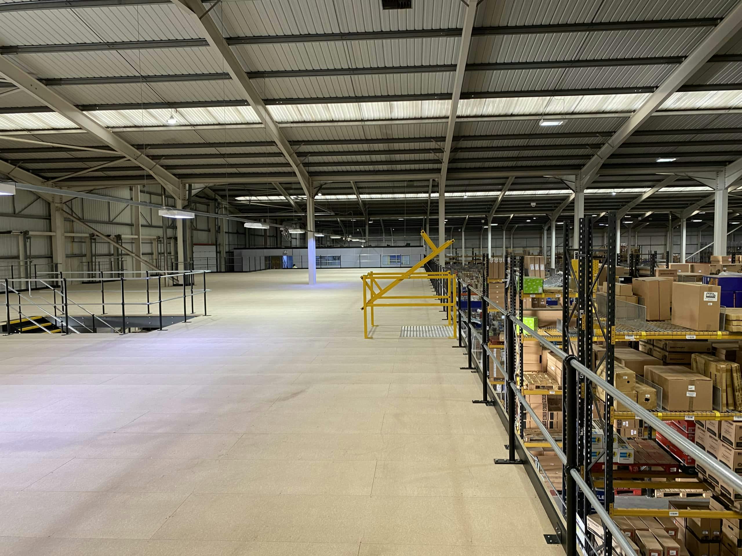 Spacious Mezzanine-level Warehouse venue with high ceilings for events and exhibitions.