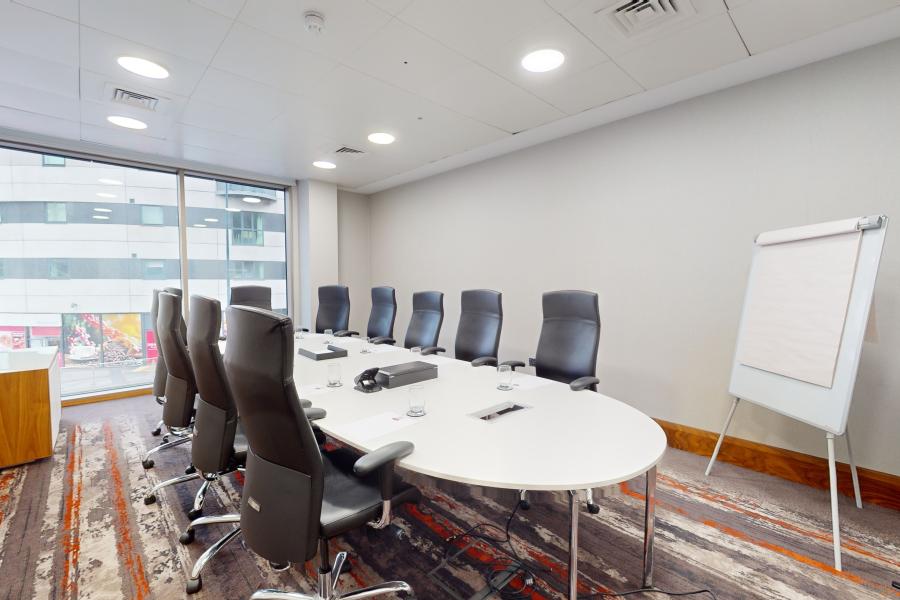 Modern conference room at Bar 11, Grosvenor House, ideal for meetings and presentations. - Banner