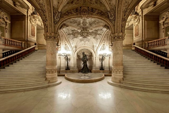 Foyers at Palais Garnier, Paris: opulent staircase for elegant gala events.