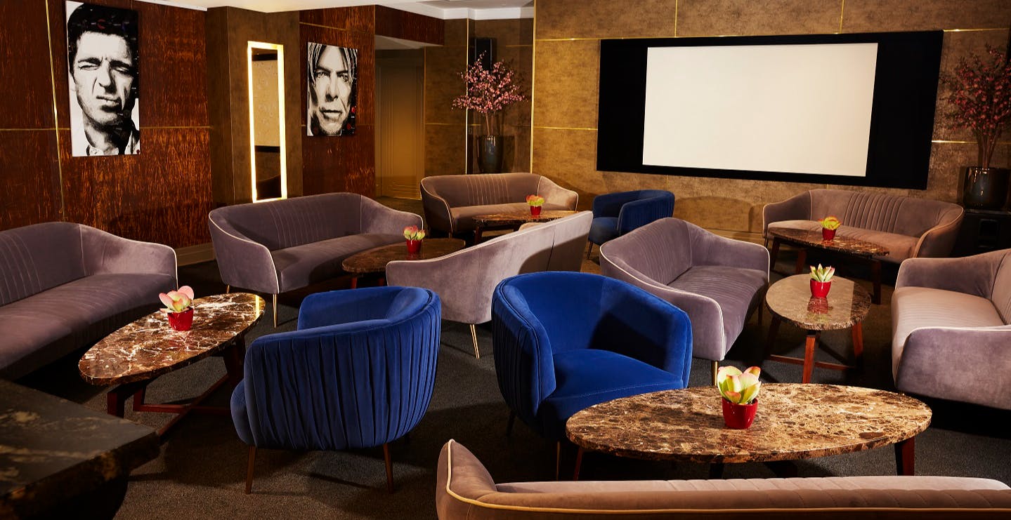 Private Cinema lounge in Karma Sanctum Soho, London - stylish seating for networking events.