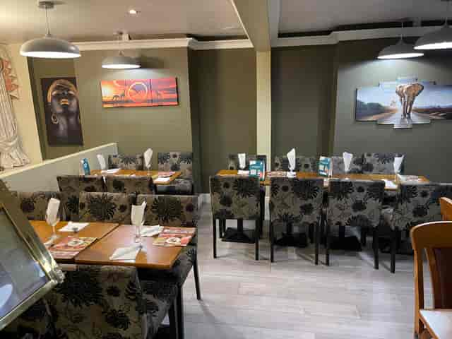 Function Rooms at The Calabash: inviting dining area for intimate gatherings and events.