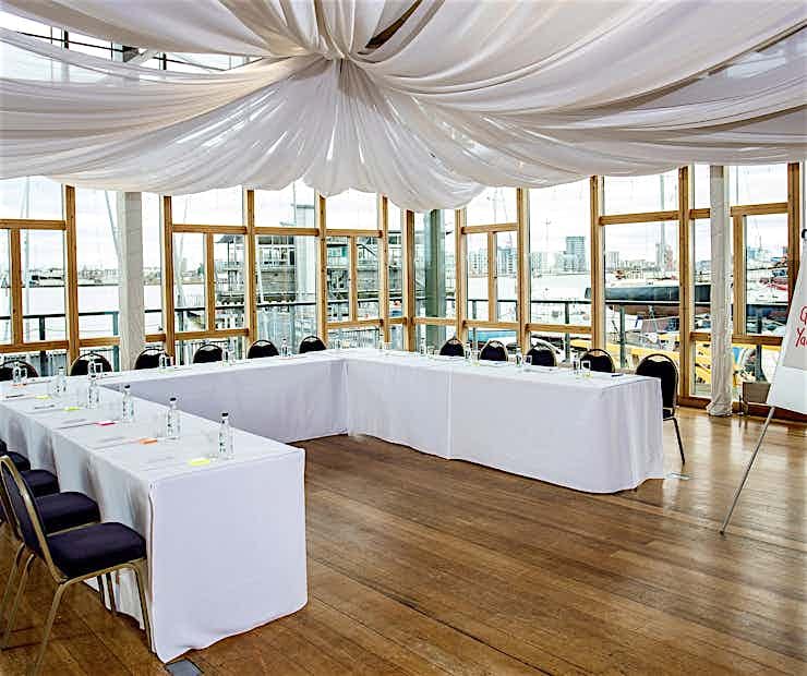 Elegant meeting space with waterfront view at The Calabash Restaurant and Bar.