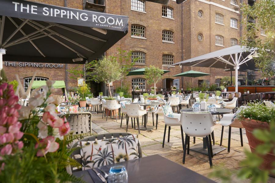 Outdoor dining area at The Fox - Warehouse Bar, perfect for events and meetings. - Banner