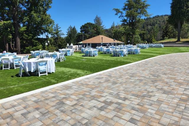 Outdoor reception area at Green Mountain Retreat with blue accents, ideal for summer weddings.