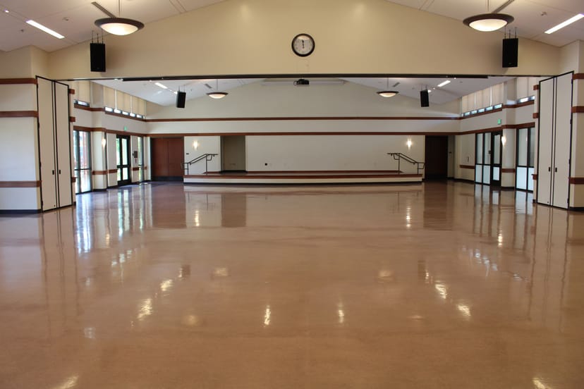 Orchard City Banquet Hall, spacious venue with polished floors for events and gatherings.