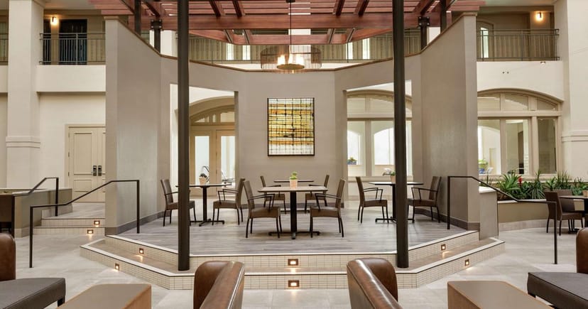 Versatile meeting space with natural light at Embassy Suites Milpitas for events.