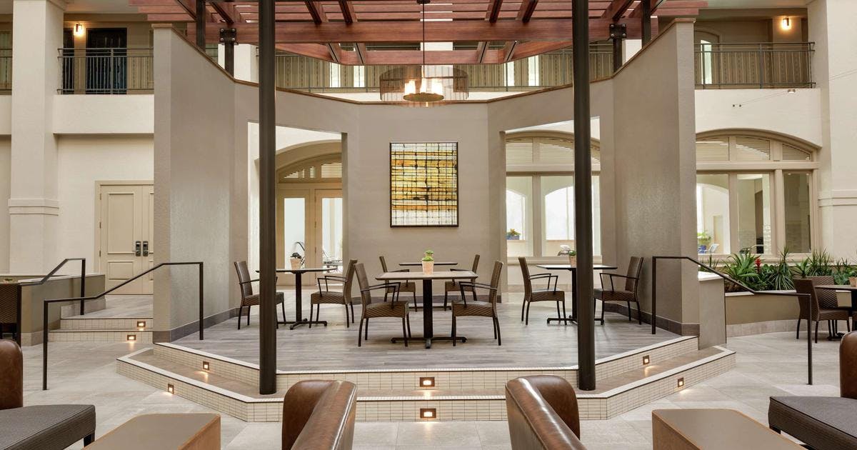 Versatile meeting space with natural light at Embassy Suites Milpitas for events.