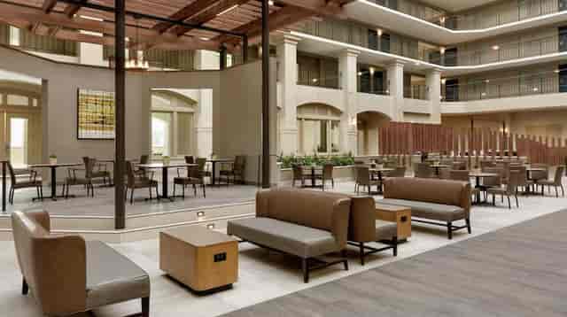 Elegant atrium at Embassy Suites Milpitas, ideal for networking events and meetings.