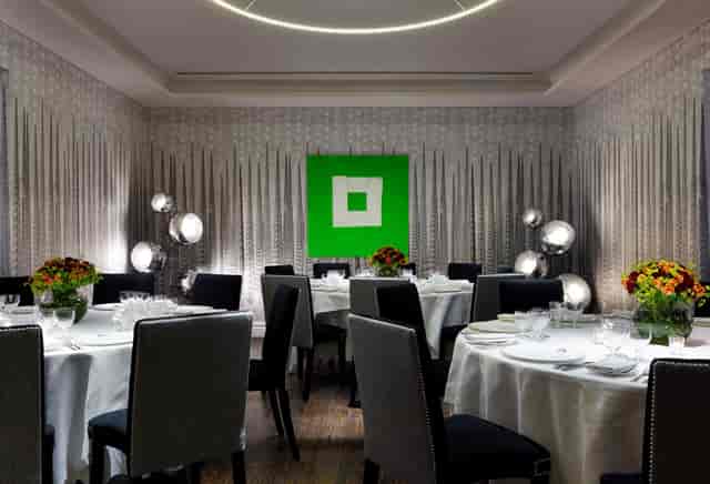 Elegant event space in Soho Hotel with floral centerpieces for upscale dinners and meetings.