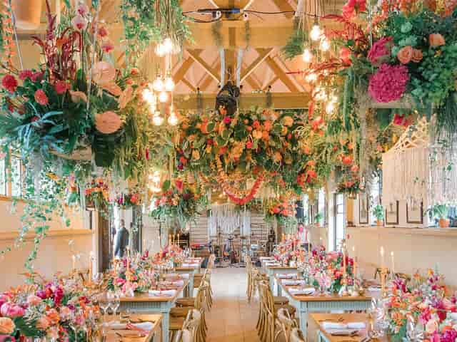 Elegant Waddesdon Hall meeting room with floral decor, perfect for weddings and upscale events.