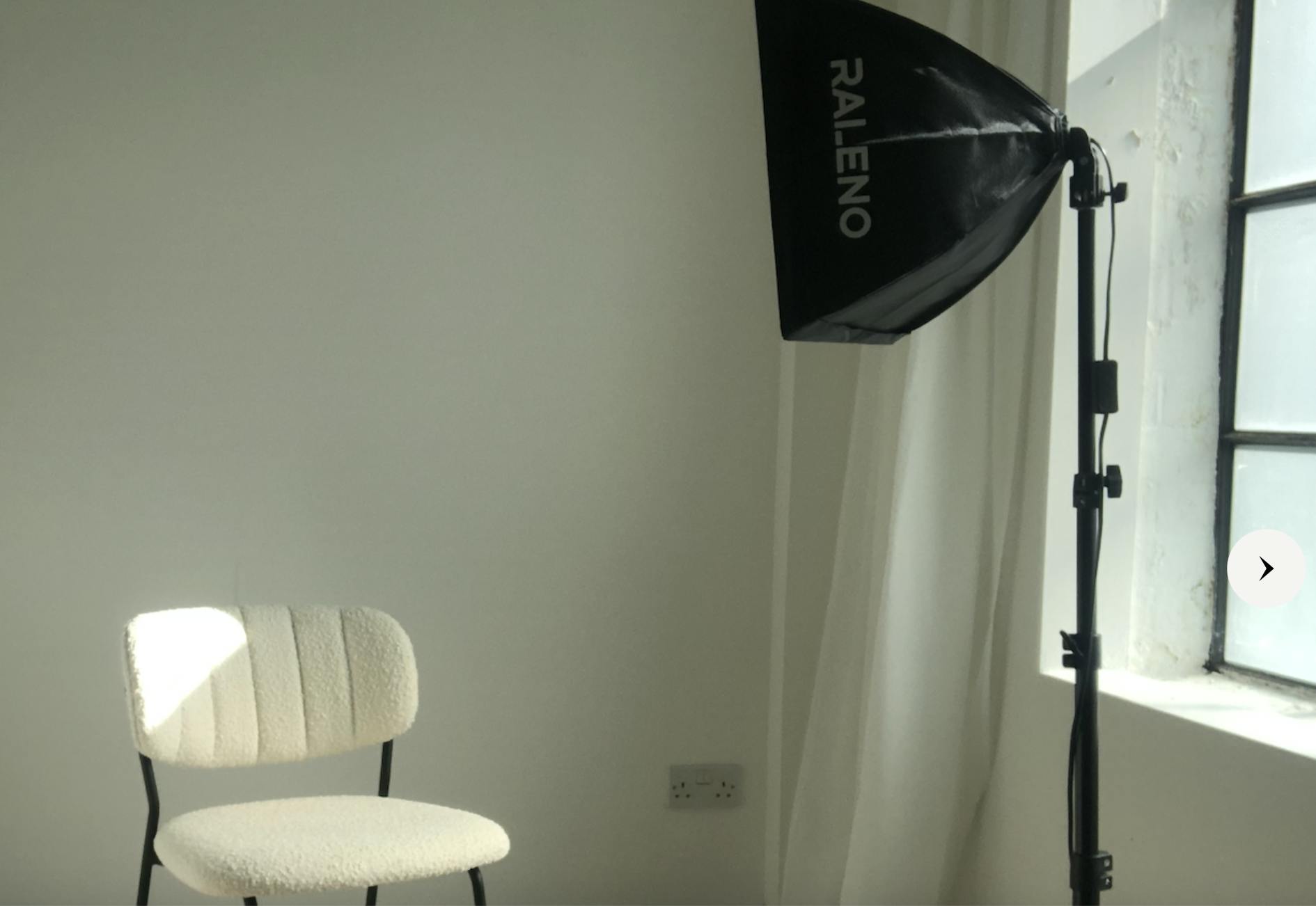 Minimalist meeting space in Sugar Studio Bristol with warm lighting for intimate events.