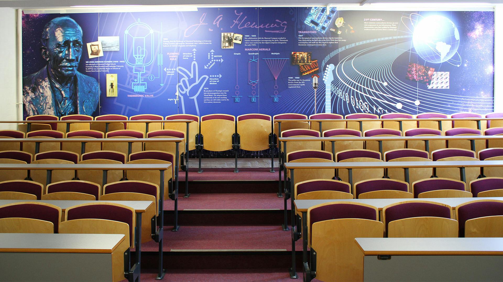 Lecture theatre with tiered seating, ideal for conferences and workshops at UCS Venues.