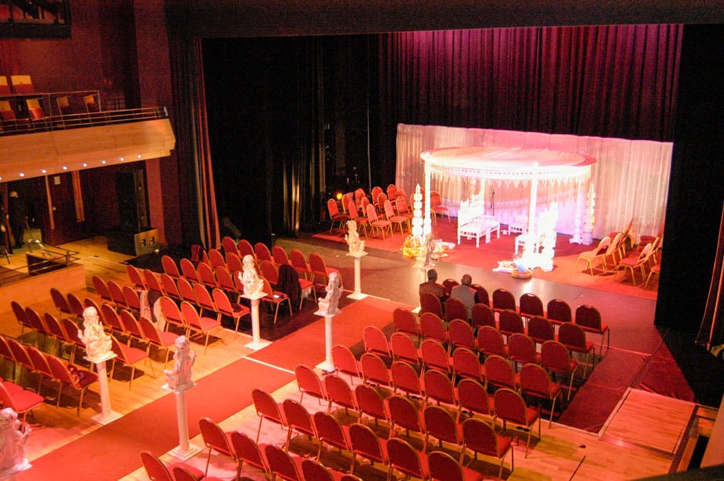 Pentland Theatre event space with elegant stage, ideal for weddings and corporate events.