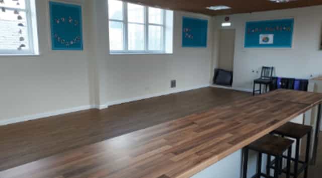 Malala Yousafzai in a bright, versatile event space for meetings and workshops.