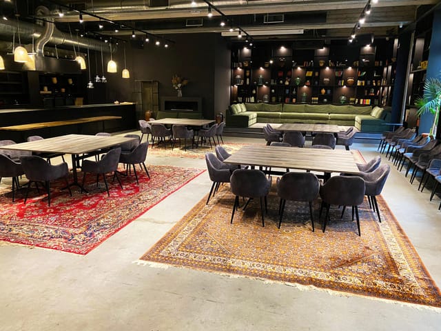 Versatile event space in Twentysix Budapest with modern decor for meetings and gatherings.