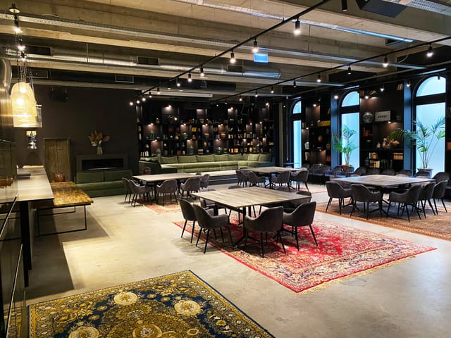 Versatile event space in Twentysix Budapest with modern decor for meetings and gatherings.