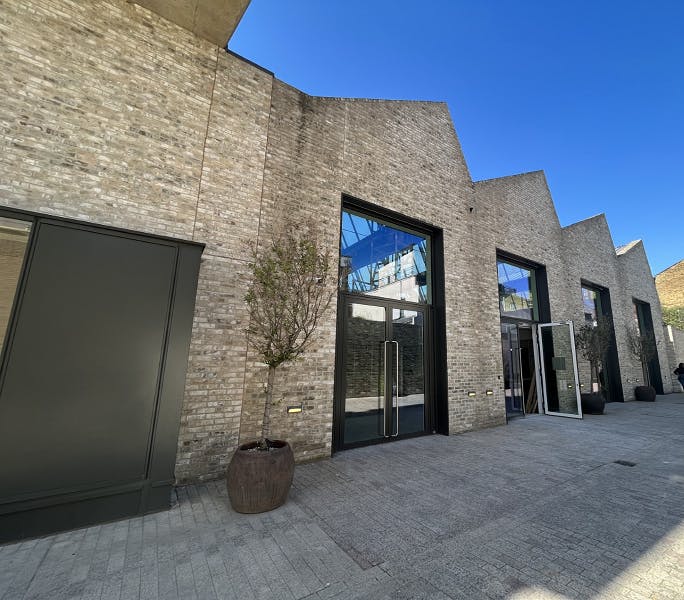 Modern Tannery Arts gallery with brick facade, perfect for events and gatherings.